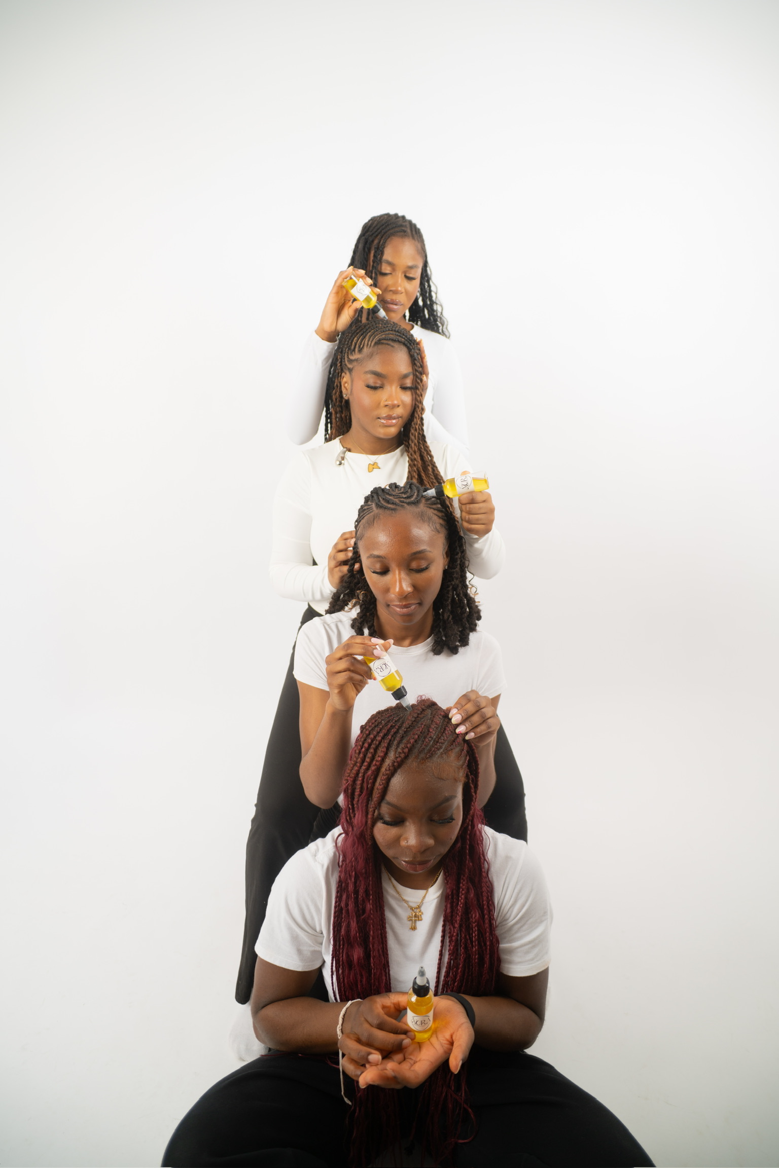 Aura Hair Oil being applied at ALuxeXperience